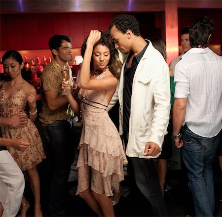 Friends Dancing in Bar Foto de stock - Con derechos protegidos, Código: 700-01164986