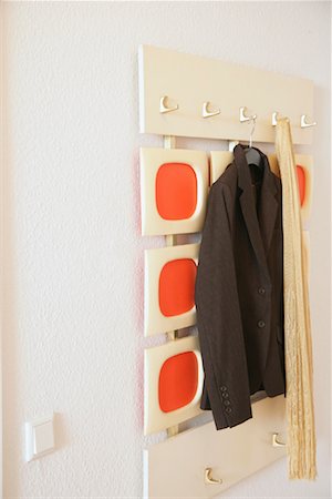 simsearch:600-03463202,k - Clothes Hanging on Hooks Foto de stock - Con derechos protegidos, Código: 700-01165046