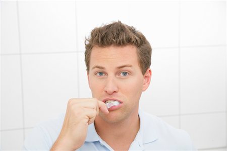 Man Brushing Teeth Stock Photo - Rights-Managed, Code: 700-01165126