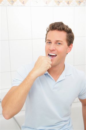 Man Brushing Teeth Stock Photo - Rights-Managed, Code: 700-01165127