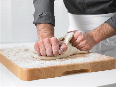 squished - Man Kneading Dough Stock Photo - Rights-Managed, Code: 700-01174087