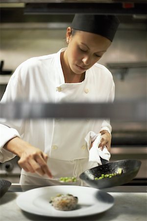 Chef Preparing Meal Foto de stock - Con derechos protegidos, Código: 700-01172146