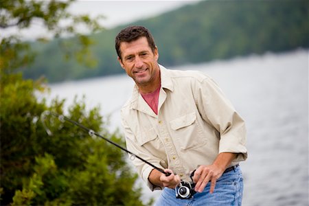 simsearch:700-02702601,k - Man Fishing Fotografie stock - Rights-Managed, Codice: 700-01172159