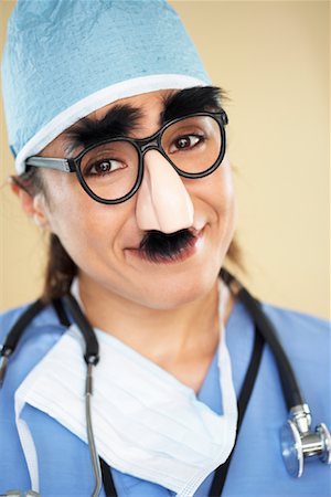 fake moustache - Portrait of Doctor Wearing Novelty Glasses Stock Photo - Rights-Managed, Code: 700-01172404