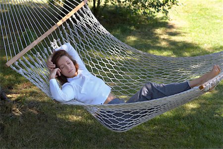 Woman Sleeping in Hammock Foto de stock - Con derechos protegidos, Código: 700-01172927