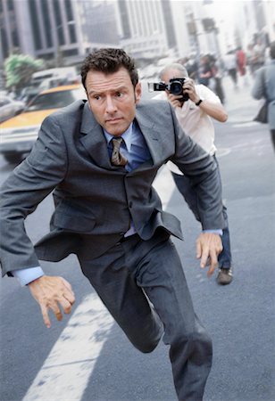 stressful city - Man Running From Paparazzi Stock Photo - Rights-Managed, Code: 700-01172960