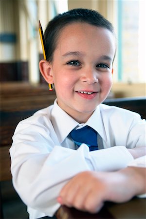 diretor de escola - Boy with Pencil behind Ear Foto de stock - Direito Controlado, Número: 700-01173184