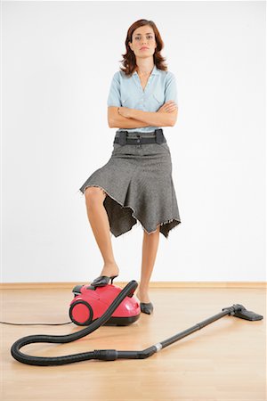 Woman with Vacuum Cleaner Stock Photo - Rights-Managed, Code: 700-01173195