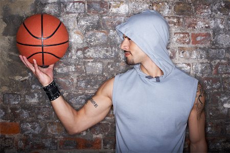 Man Holding Basketball Stock Photo - Rights-Managed, Code: 700-01184864