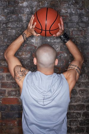 Man Holding Basketball Stock Photo - Rights-Managed, Code: 700-01184867
