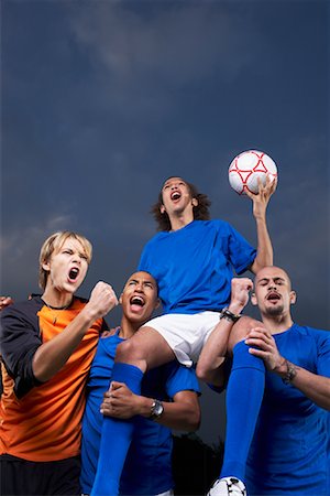 pic of a black boy playing soccer - Soccer Players Celebrating Stock Photo - Rights-Managed, Code: 700-01184917