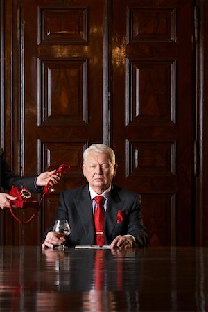 Businessman Receiving Call in Boardroom Stock Photo - Rights-Managed, Code: 700-01184973