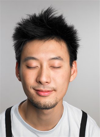 eyes closed portrait of asian man - Portrait of Man with Eyes Closed Stock Photo - Rights-Managed, Code: 700-01185044