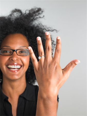 diamond ring on black hand