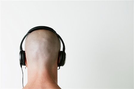 Man Using Headphones Stock Photo - Rights-Managed, Code: 700-01185544