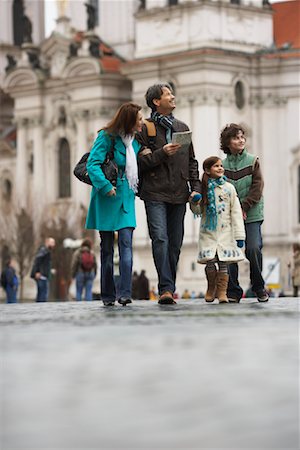 simsearch:700-02645918,k - Family Walking on Street Stock Photo - Rights-Managed, Code: 700-01185726