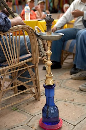 People at Outdoor Cafe Smoking Hookah Pipe, Kitchener's Island, Aswan, Egypt Fotografie stock - Rights-Managed, Codice: 700-01182764