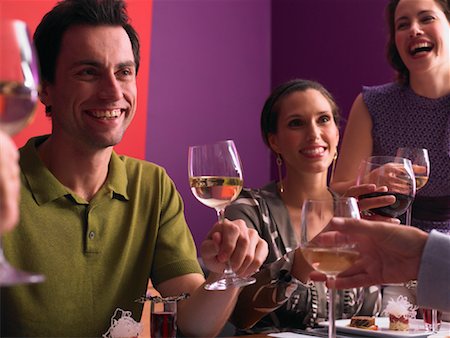 friends toasting dinner - People Toasting at Dinner Party Stock Photo - Rights-Managed, Code: 700-01183886