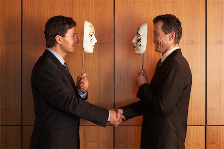 phoney smile - Businessmen with Theatrical Masks Stock Photo - Rights-Managed, Code: 700-01194335