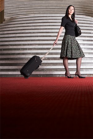 Woman with Luggage in Hotel Foyer Stock Photo - Rights-Managed, Code: 700-01194372