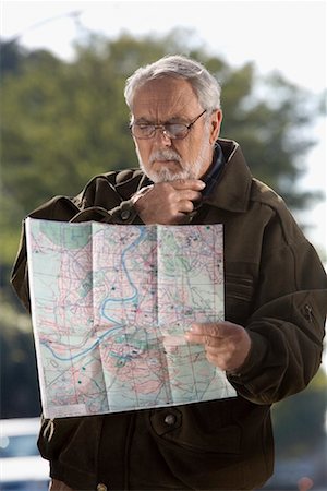 Man Looking at Map Stock Photo - Rights-Managed, Code: 700-01194897