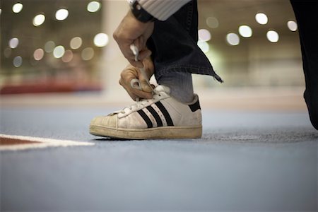 foreground legs - Man Tying Shoes Stock Photo - Rights-Managed, Code: 700-01195326