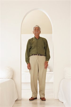 Portrait of Man Standing in Doorway Stock Photo - Rights-Managed, Code: 700-01195366