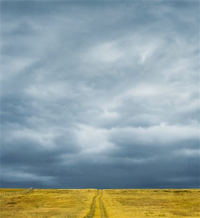 storm farmland photography - Tire Tracks in Field, L'Ile Verte, Quebec, Canada Stock Photo - Rights-Managed, Code: 700-01195860