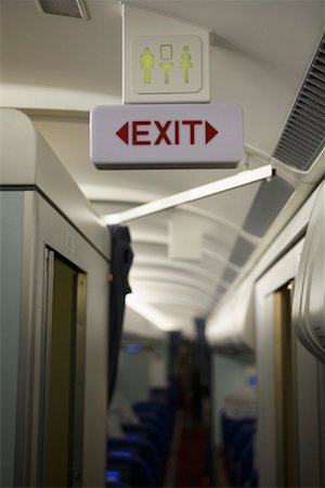 simsearch:693-06018946,k - Airplane Exit Sign Foto de stock - Con derechos protegidos, Código: 700-01196056