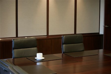 Coffee Cup on Boardroom Table Stock Photo - Rights-Managed, Code: 700-01196105