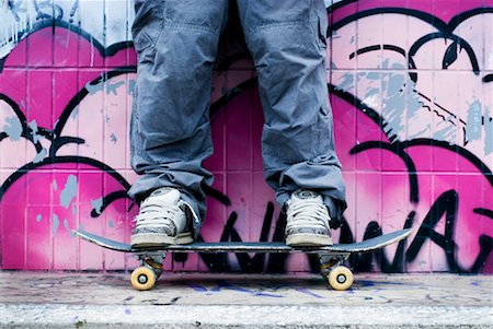 Person Standing on Skateboard Stock Photo - Rights-Managed, Code: 700-01196144