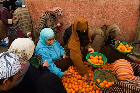 picking oranges - Women at Orange Stand, Souk, Marrakech, Morocco Stock Photo - Rights-Managed, Code: 700-01198855