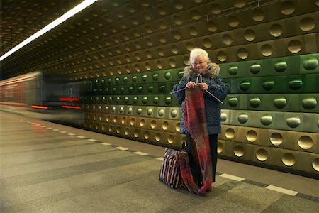 Woman Knitting at Subway Station Stock Photo - Rights-Managed, Code: 700-01199255