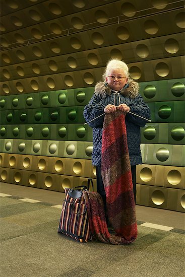 Woman Knitting at Subway Station Stock Photo - Premium Rights-Managed, Artist: Masterfile, Image code: 700-01199253