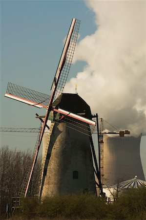 steam power plant - Windmill by Nuclear Power Plant, Doel, Belgium Stock Photo - Rights-Managed, Code: 700-01199799