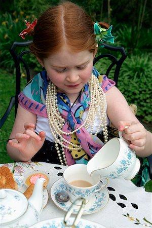 Girl at Tea Party Foto de stock - Con derechos protegidos, Código: 700-01199828