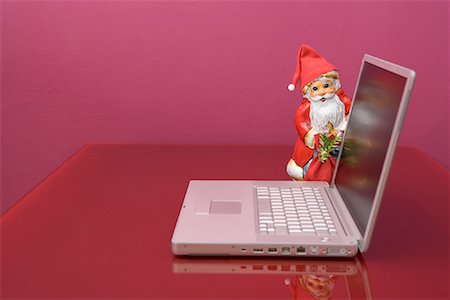 simsearch:700-02972955,k - Santa Figurine and Laptop Stock Photo - Rights-Managed, Code: 700-01199849