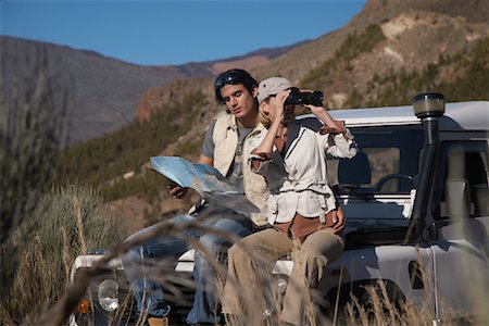 sitting car hood - Couple Sitting on Jeep Stock Photo - Rights-Managed, Code: 700-01199881