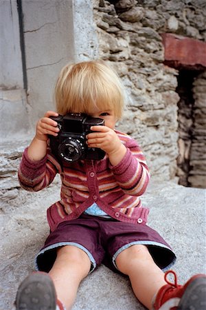 Little Girl with Toy Camera Foto de stock - Con derechos protegidos, Código: 700-01200216