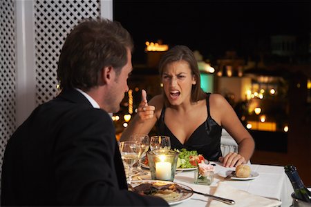 simsearch:700-01295631,k - Couple de combat au Restaurant Photographie de stock - Rights-Managed, Code: 700-01200477