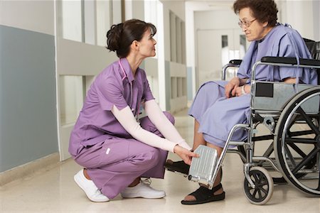 people with special needs working - Doctor and Patient in Hospital Stock Photo - Rights-Managed, Code: 700-01224098