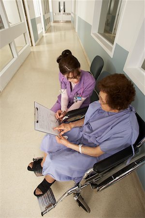 doctor elderly patient - Doctor and Patient in Hospital Foto de stock - Con derechos protegidos, Código: 700-01224111