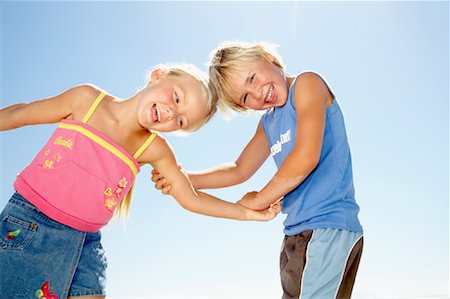 family tickling - Brother and Sister Goofing Around Stock Photo - Rights-Managed, Code: 700-01223314