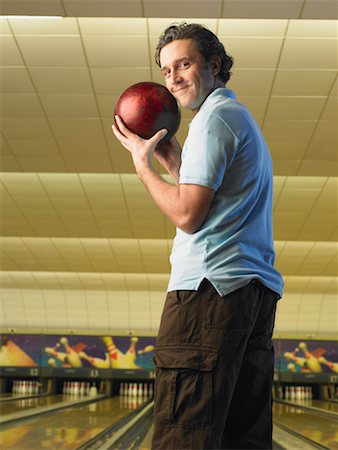 Man at Bowling Alley Stock Photo - Rights-Managed, Code: 700-01223417