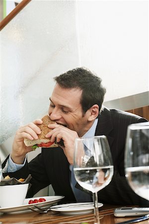 pigging out - Man Eating in Restaurant Stock Photo - Rights-Managed, Code: 700-01223509