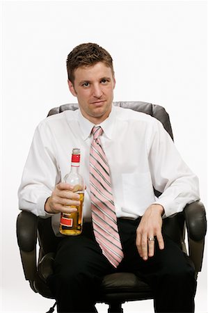 simsearch:700-03456806,k - Businessman Drinking Liquor Stock Photo - Rights-Managed, Code: 700-01223714