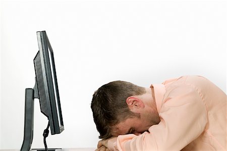 stressed guy working late - Businessman Sleeping on the Job Stock Photo - Rights-Managed, Code: 700-01223717