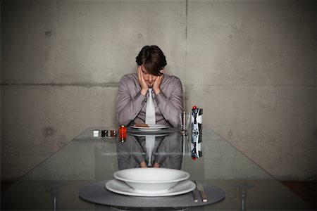 Man at Dining Room Table Stock Photo - Rights-Managed, Code: 700-01223794