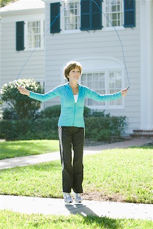 simsearch:700-00918032,k - Mature Woman Skipping Rope Foto de stock - Con derechos protegidos, Código: 700-01223952