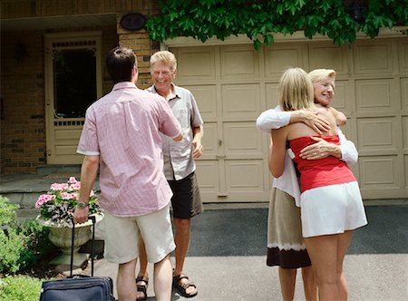 family in garage - Family Greeting Each Other Stock Photo - Rights-Managed, Code: 700-01234792